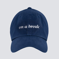boné dad hat on a break